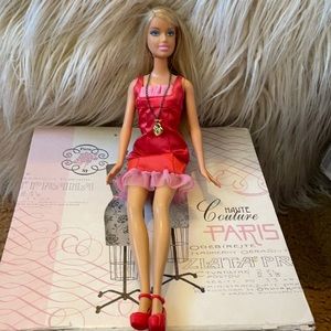 Vintage Barbie doll with heart necklace